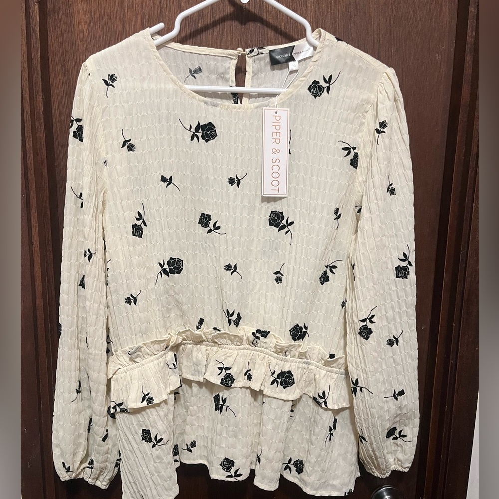 Piper and Scoot long sleeve loose peplum style blouse